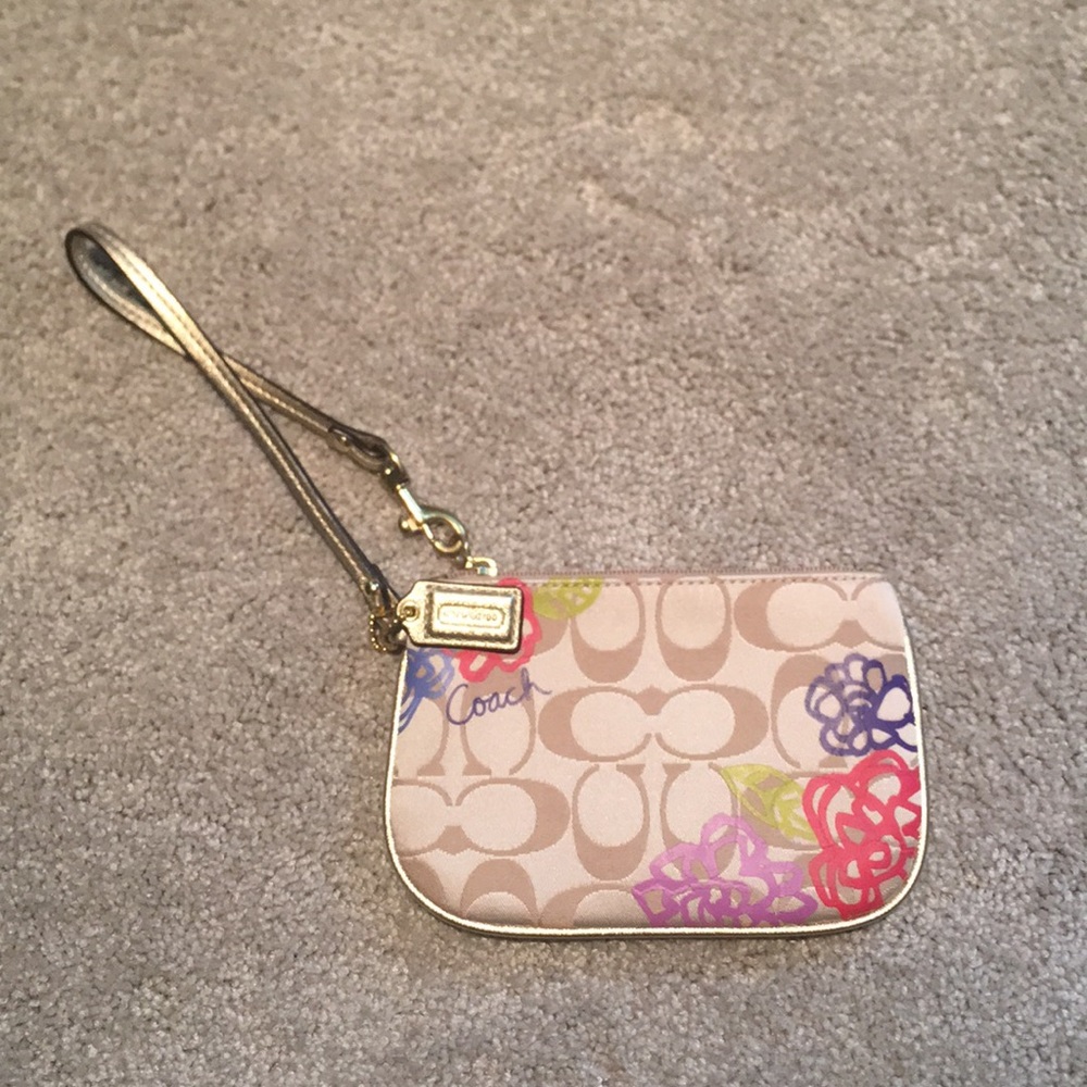 Gold and tan floral coach wristlet